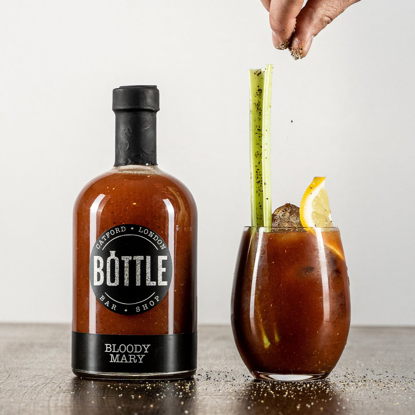 Bloody Mary served with garnish and celery stick