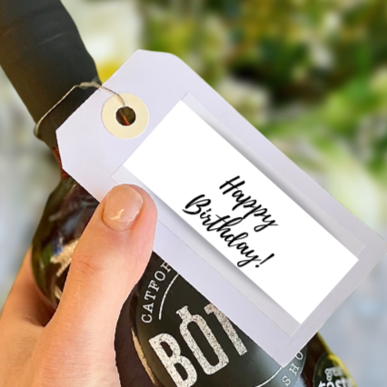 Happy Birthday on a bottled cocktail
