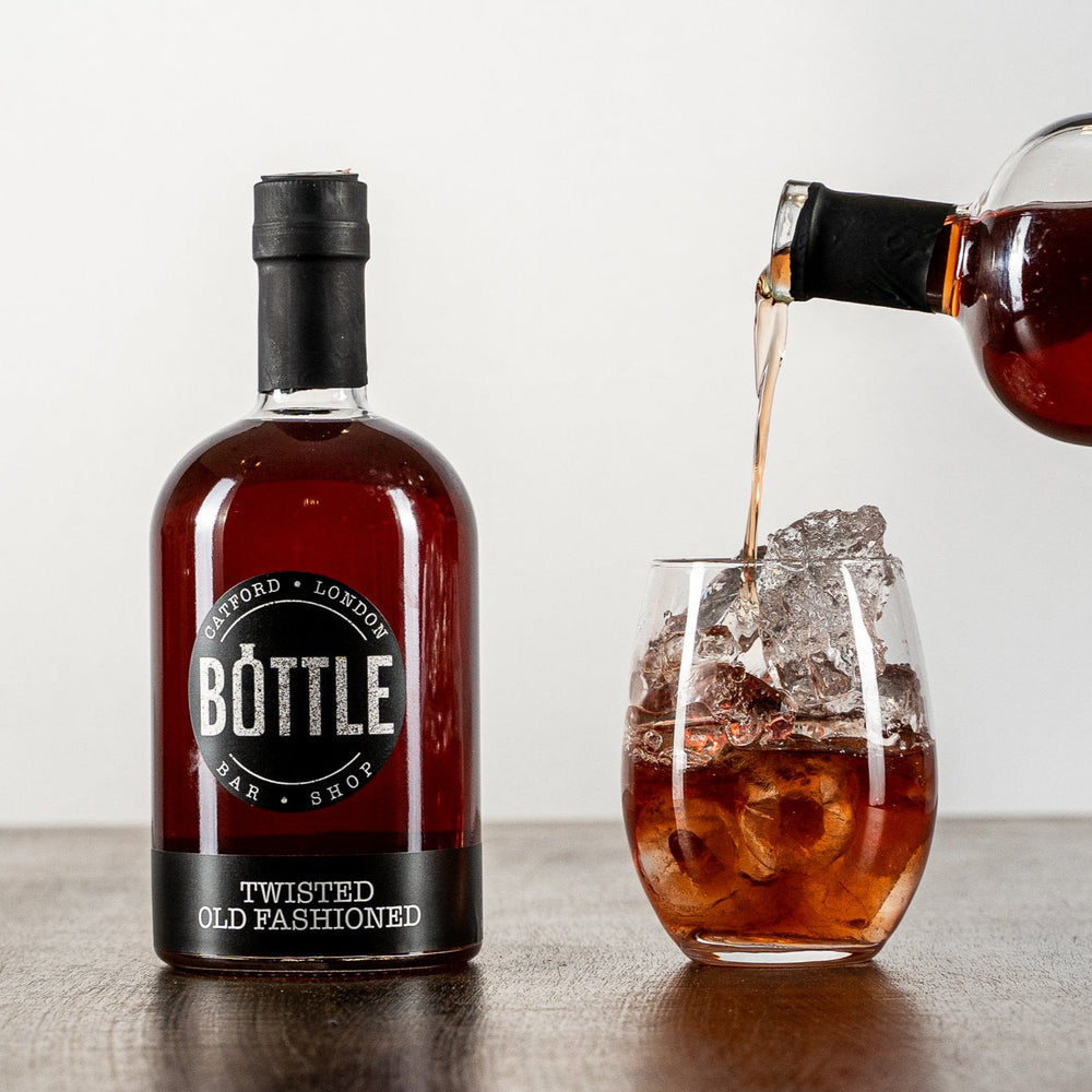 Award winning Twisted-Old-Fashioned-cocktail, made in small batches, made in the UK poured into a  cocktail glass