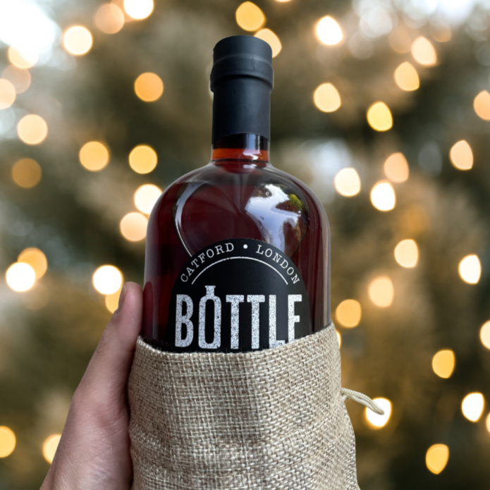 
                  
                    Christmas Negroni in a natural canvas gift bag
                  
                