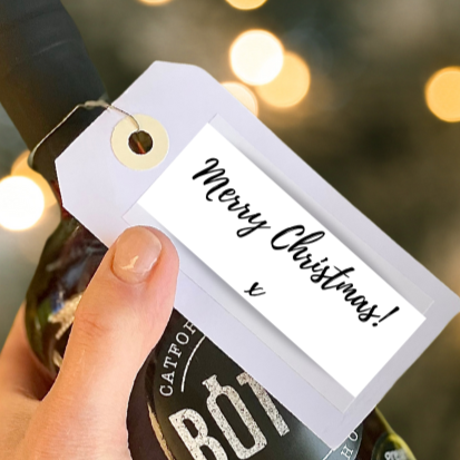 
                  
                    Merry Christmas message on a label on a bottled cocktail
                  
                